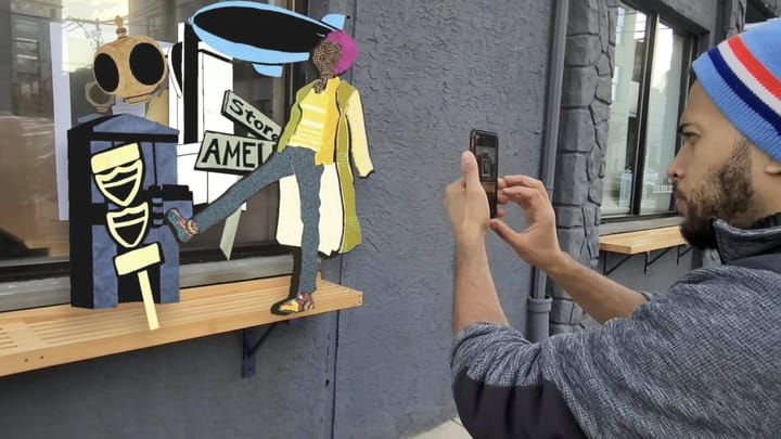 The Akron Art Museum’s Interplay: Art Play for All project transforms a poster into an interactive augmented reality spectacle